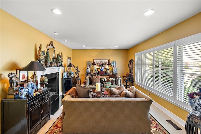 1301 Fairway Dr, Birmingham, MI 48009 - living area with recessed lighting, light carpet, baseboards, and a fireplace