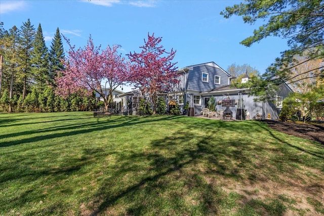1301 Fairway Dr, Birmingham, MI 48009 - view of grassy yard with a patio area
