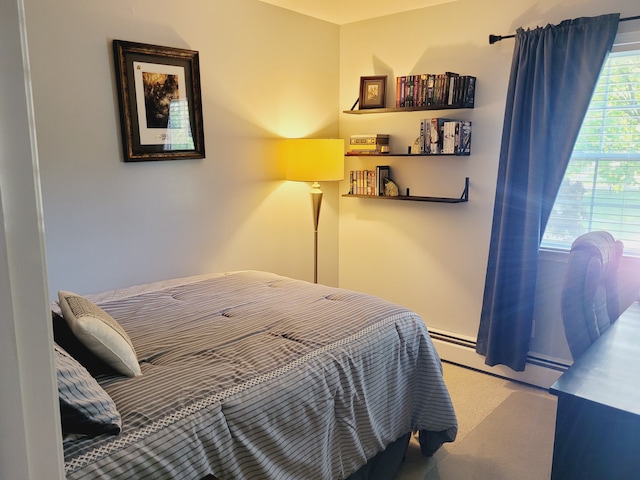 bedroom with a baseboard radiator