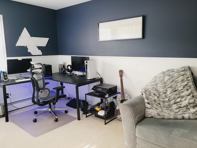 home office featuring carpet floors and wainscoting
