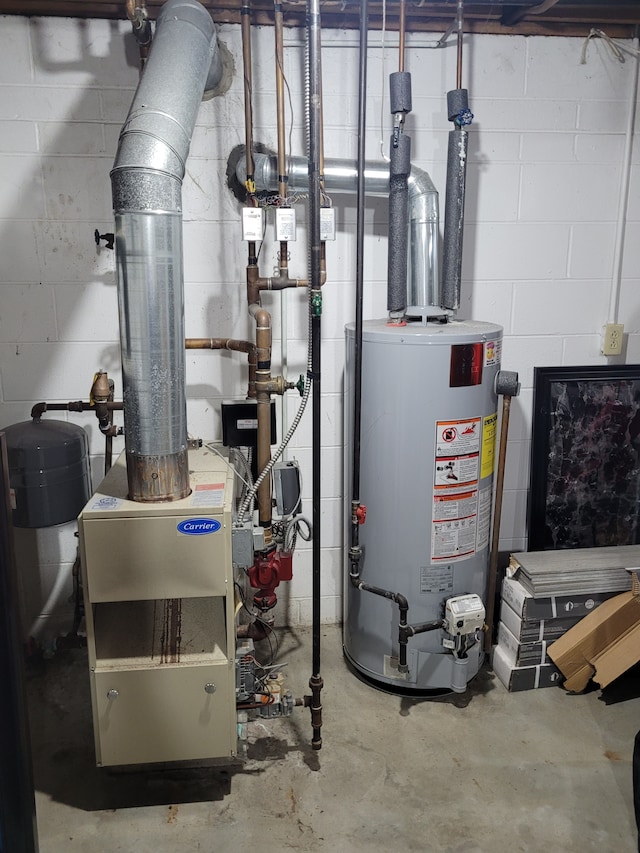 utilities featuring gas water heater and a heating unit