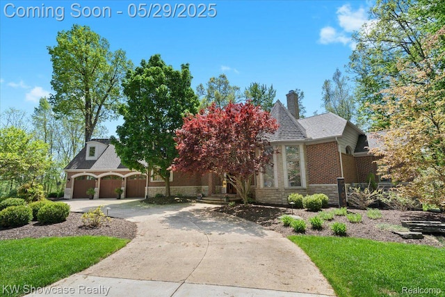 4563 Haverhill, Commerce Twp, MI 48382 - view of front of home featuring stone siding, driveway, a chimney, and a shingled roof