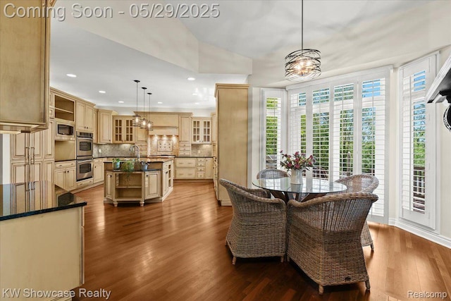 4563 Haverhill, Commerce Twp, MI 48382 - dining room featuring dark wood-type flooring, recessed lighting, and a chandelier