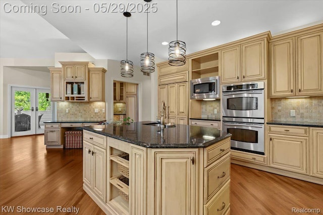 4563 Haverhill, Commerce Twp, MI 48382 - kitchen with open shelves, appliances with stainless steel finishes, a sink, wood finished floors, and recessed lighting