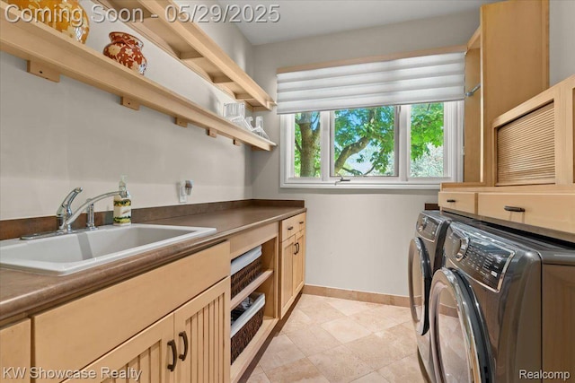 4563 Haverhill, Commerce Twp, MI 48382 - laundry room featuring independent washer and dryer, cabinet space, and baseboards