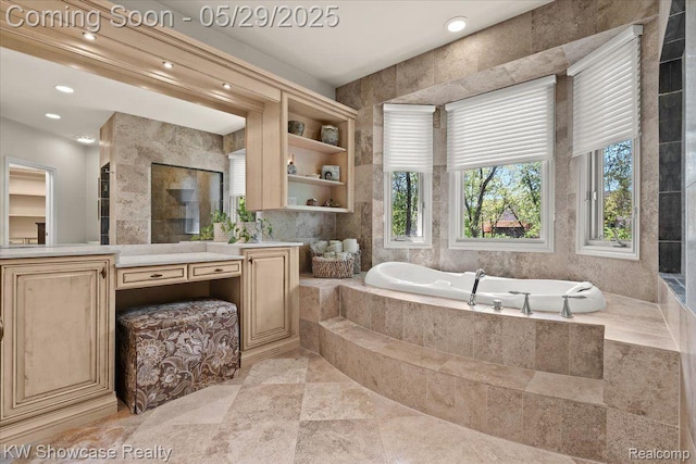 4563 Haverhill, Commerce Twp, MI 48382 - bathroom with vanity, a garden tub, and recessed lighting