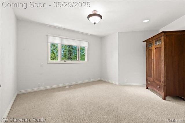 4563 Haverhill, Commerce Twp, MI 48382 - unfurnished bedroom with light colored carpet, baseboards, and recessed lighting