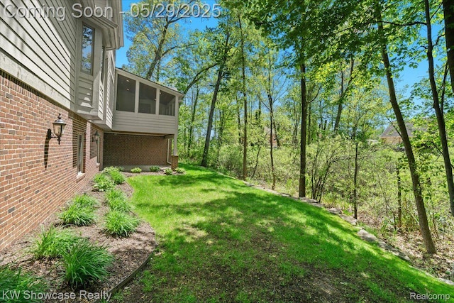 4563 Haverhill, Commerce Twp, MI 48382 - view of green lawn featuring a sunroom