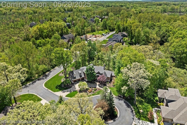 4563 Haverhill, Commerce Twp, MI 48382 - aerial view of property and surrounding area with a heavily wooded area and nearby suburban area