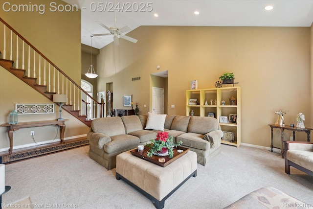 921 Gleneagles, Highland, MI 48357 - living area featuring carpet, stairway, high vaulted ceiling, ceiling fan, and baseboards