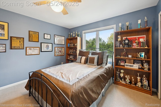 921 Gleneagles, Highland, MI 48357 - carpeted bedroom with baseboards and a ceiling fan