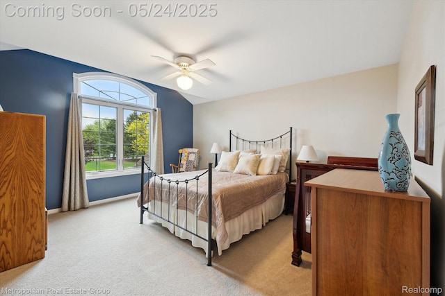 921 Gleneagles, Highland, MI 48357 - bedroom with light carpet, baseboards, a ceiling fan, and vaulted ceiling