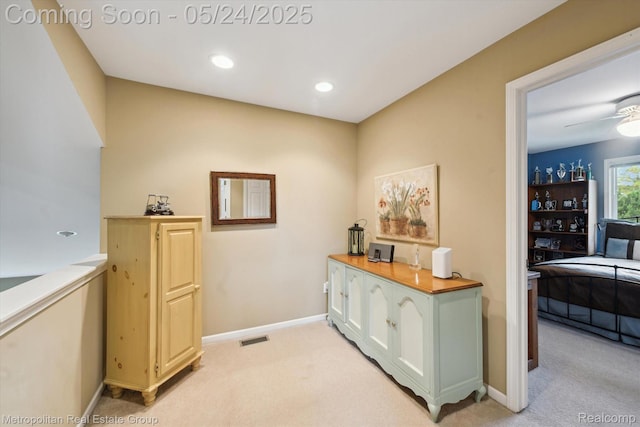 921 Gleneagles, Highland, MI 48357 - hall featuring light colored carpet, baseboards, and recessed lighting