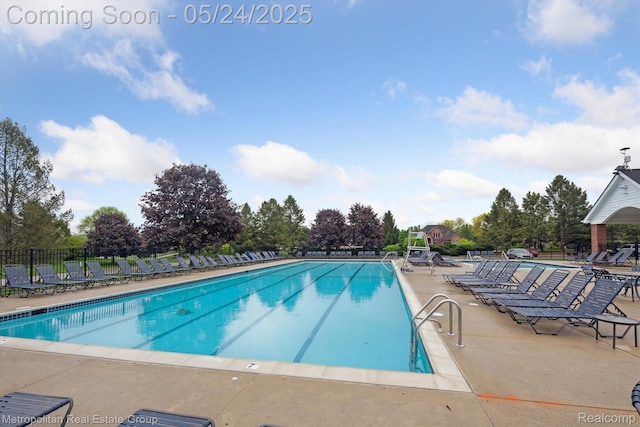 921 Gleneagles, Highland, MI 48357 - community pool featuring a patio