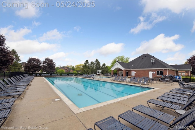 921 Gleneagles, Highland, MI 48357 - community pool featuring a patio area