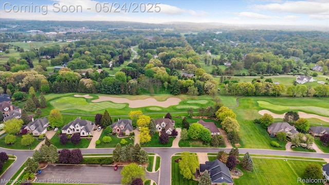 921 Gleneagles, Highland, MI 48357 - aerial perspective of suburban area featuring a local golf course