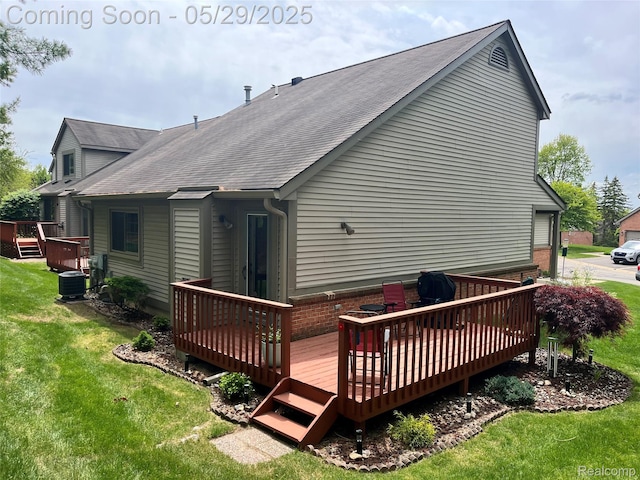 995 Hickory Dr, Brighton, MI 48116 - rear view of property with central AC, a yard, a deck, and roof with shingles