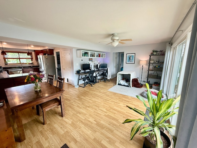 992 Key W Dr, Clawson, MI 48017 - living area featuring a desk, light wood-style floors, and ceiling fan