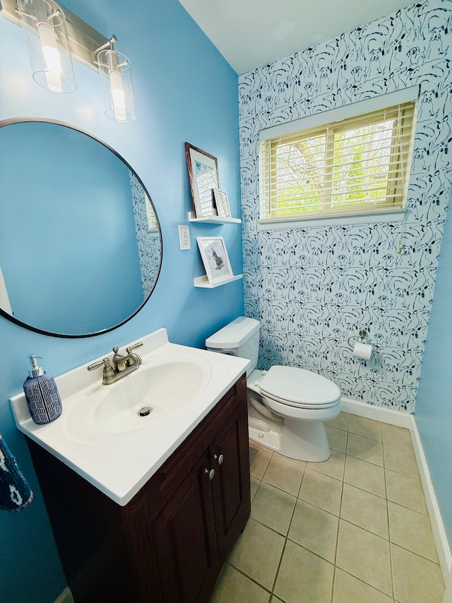 992 Key W Dr, Clawson, MI 48017 - half bathroom with toilet, baseboards, wallpapered walls, tile patterned flooring, and vanity
