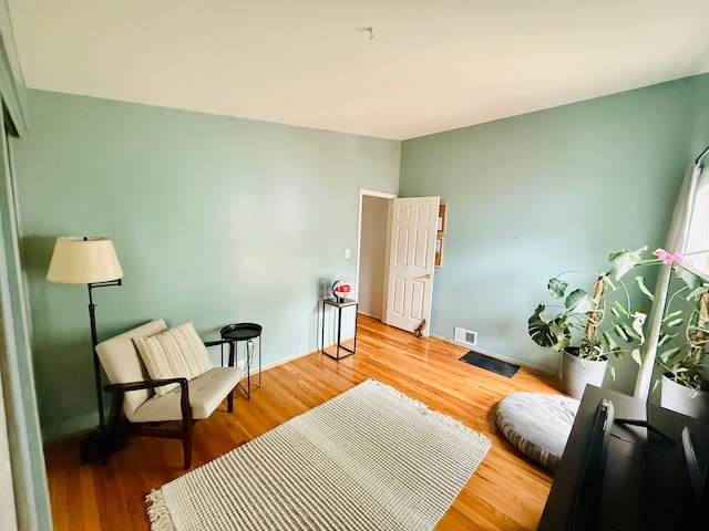 992 Key W Dr, Clawson, MI 48017 - living area with light wood-type flooring and baseboards