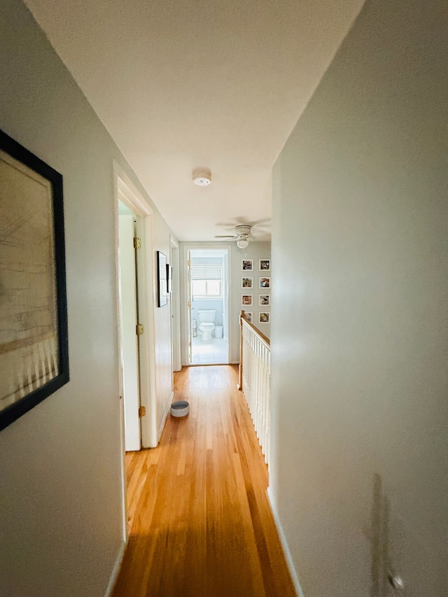 992 Key W Dr, Clawson, MI 48017 - hallway with light wood-style floors and baseboards