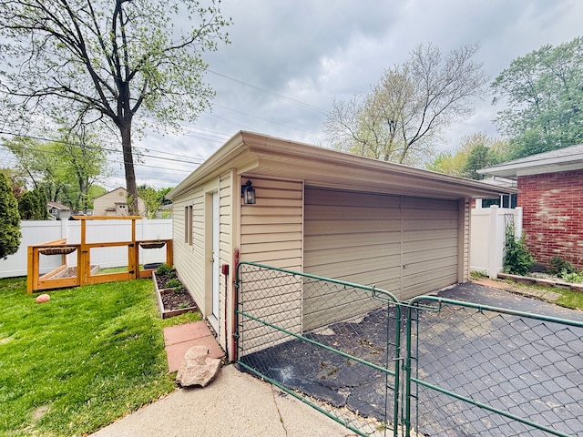 992 Key W Dr, Clawson, MI 48017 - detached garage featuring a gate
