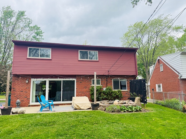 992 Key W Dr, Clawson, MI 48017 - back of house with a patio area and brick siding