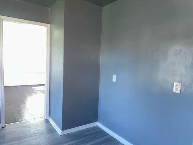 1688 S Ethel St, Detroit, MI 48217 - hall featuring wood finished floors and baseboards