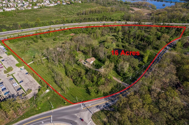 1930 Hogback Rd, Ann Arbor, MI 48105 - aerial view of property's location with property boundaries highlighted and a nearby body of water