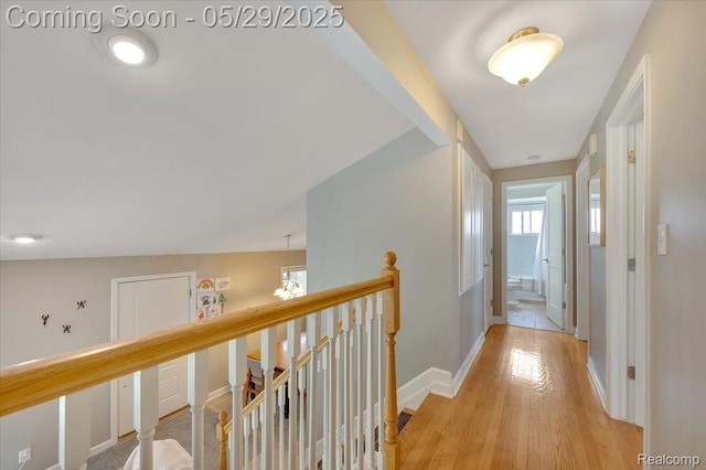 1227 Sycamore Dr, Rochester Hills, MI 48307 - hall with light wood-style flooring, an upstairs landing, and baseboards