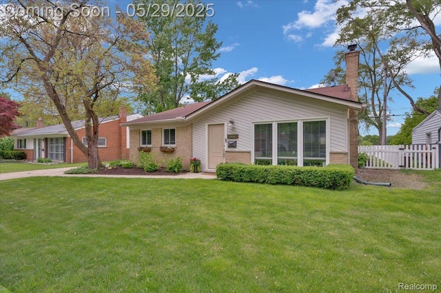 1227 Sycamore Dr, Rochester Hills, MI 48307 - ranch-style home with a chimney and brick siding
