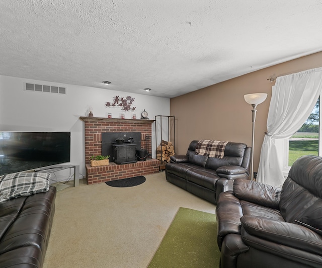 11589 Owosso Rd, Fowlerville, MI 48836 - living area with a textured ceiling, carpet floors, and a wood stove