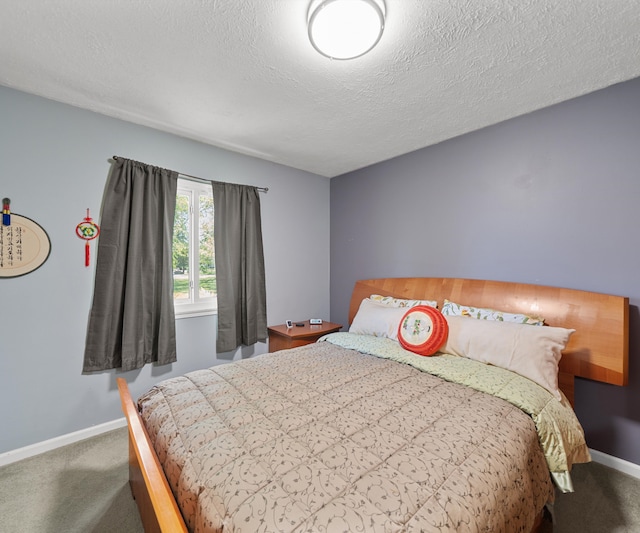 11589 Owosso Rd, Fowlerville, MI 48836 - carpeted bedroom with baseboards and a textured ceiling
