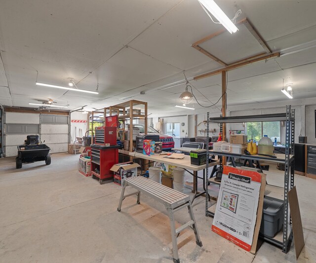 11589 Owosso Rd, Fowlerville, MI 48836 - garage with a workshop area