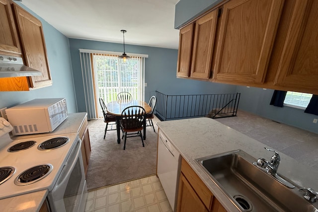 1478 Harbor Dr, Walled Lake, MI 48390 - kitchen featuring white appliances, a sink, under cabinet range hood, and plenty of natural light