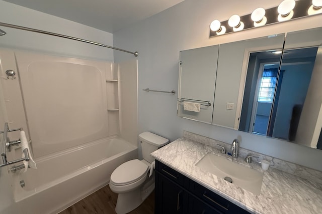 1478 Harbor Dr, Walled Lake, MI 48390 - bathroom with toilet, bathtub / shower combination, vanity, and wood finished floors