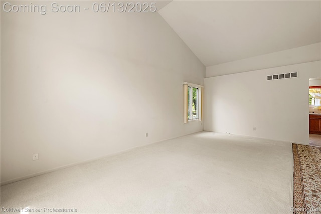 634 Eastway Cir Unit # 20, Lapeer, MI 48446 - unfurnished room with high vaulted ceiling and carpet