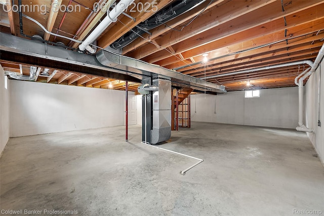 634 Eastway Cir Unit # 20, Lapeer, MI 48446 - basement featuring heating unit and stairs