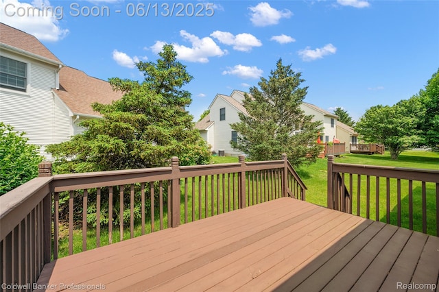 634 Eastway Cir Unit # 20, Lapeer, MI 48446 - deck with a lawn and a residential view
