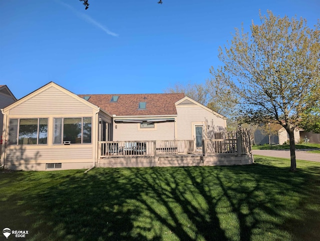 9419 Grandview Ct, Davison, MI 48423 - rear view of house with a wooden deck, a yard, and roof with shingles