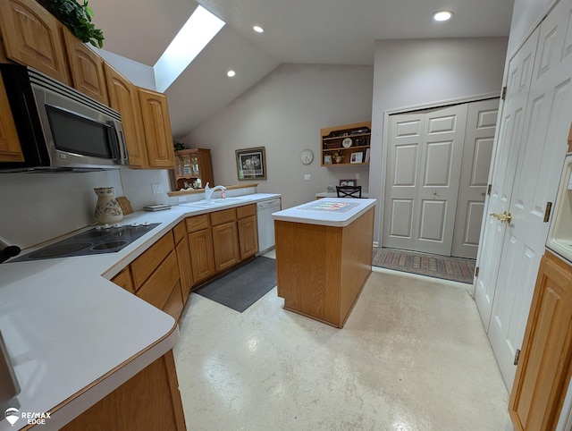 9419 Grandview Ct, Davison, MI 48423 - kitchen with stainless steel microwave, white dishwasher, a sink, lofted ceiling, and light countertops