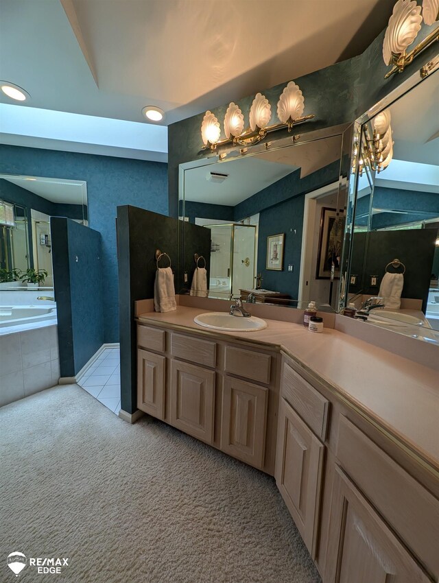 9419 Grandview Ct, Davison, MI 48423 - bathroom with a shower with door, vanity, a bath, and tile patterned floors