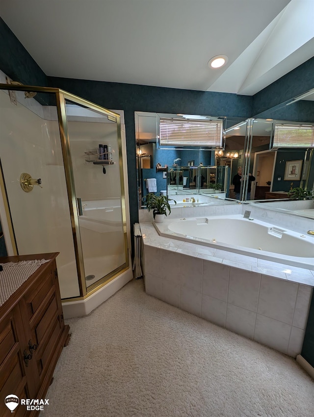 9419 Grandview Ct, Davison, MI 48423 - full bath featuring a tub with jets, a stall shower, and vaulted ceiling