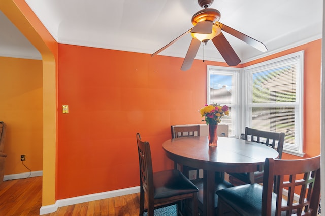 2270 23rd St, Wyandotte, MI 48192 - dining room with ceiling fan, wood finished floors, baseboards, and crown molding