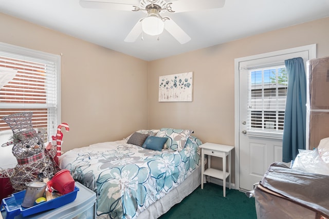 2270 23rd St, Wyandotte, MI 48192 - carpeted bedroom with a ceiling fan