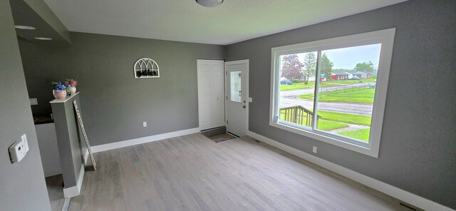 6241 Bermuda Ln, Mount Morris, MI 48458 - entrance foyer with wood finished floors and baseboards