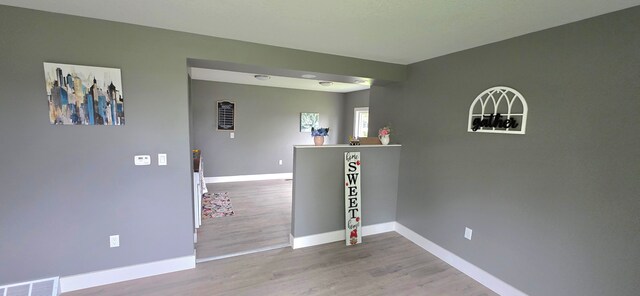 6241 Bermuda Ln, Mount Morris, MI 48458 - empty room featuring baseboards and wood finished floors
