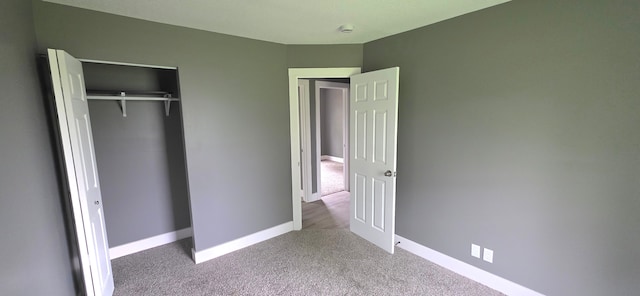 6241 Bermuda Ln, Mount Morris, MI 48458 - unfurnished bedroom with carpet flooring, baseboards, and a closet