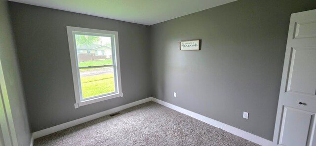6241 Bermuda Ln, Mount Morris, MI 48458 - empty room with carpet floors and baseboards