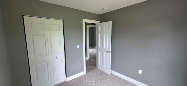 6241 Bermuda Ln, Mount Morris, MI 48458 - unfurnished bedroom with light carpet, baseboards, and a closet